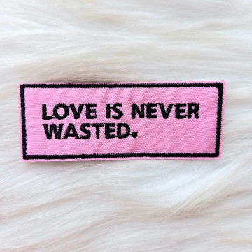 Roze Tekst  Love is never wasted